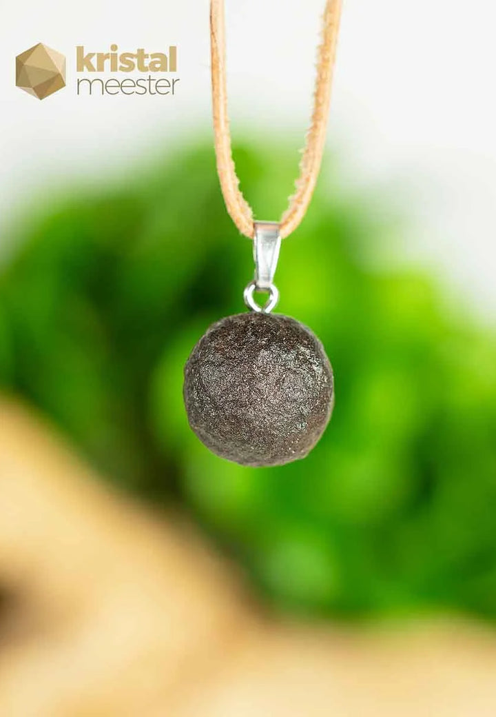 Moqui Marbles pendant with silver loop - no. 3